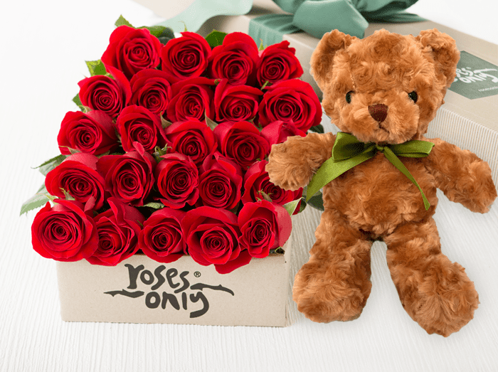 rose covered teddy bear